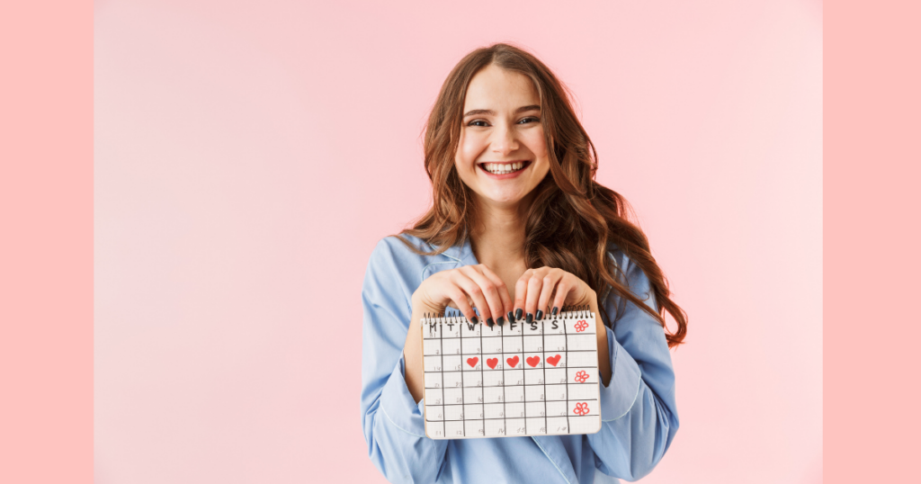 woman holding calendar marking when starting hypnobabies