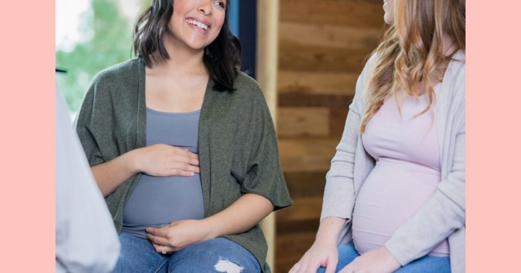 pregnant women chatting in childbirth class